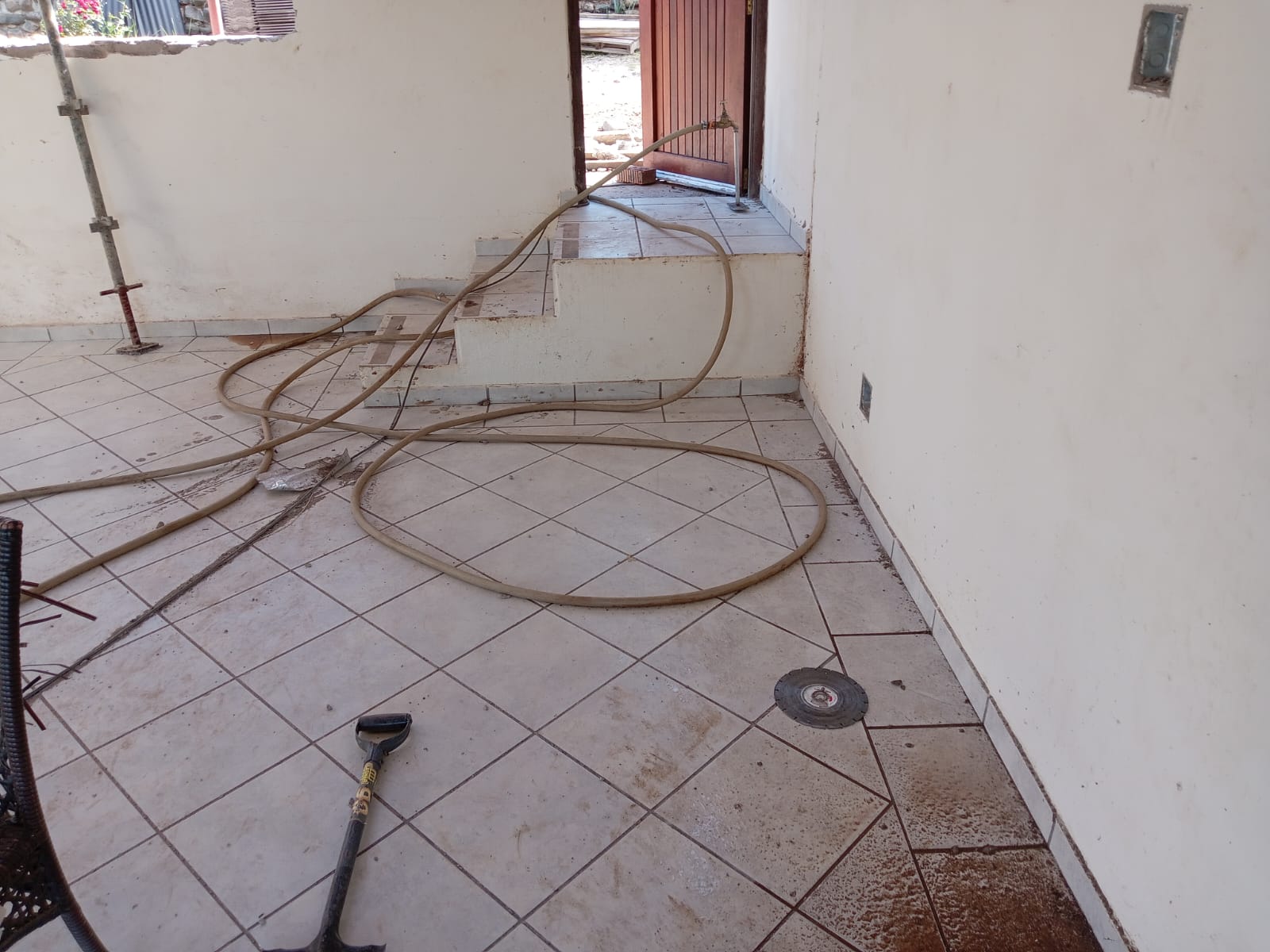 Pest control technician in full personal protective equipment during a treatment in KwaZulu-Natal